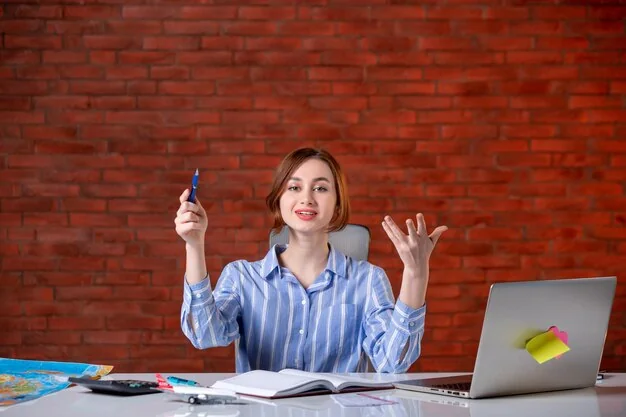 A travel agent at her laptop, mid-explanation: more airline content now reaches the agency screen.