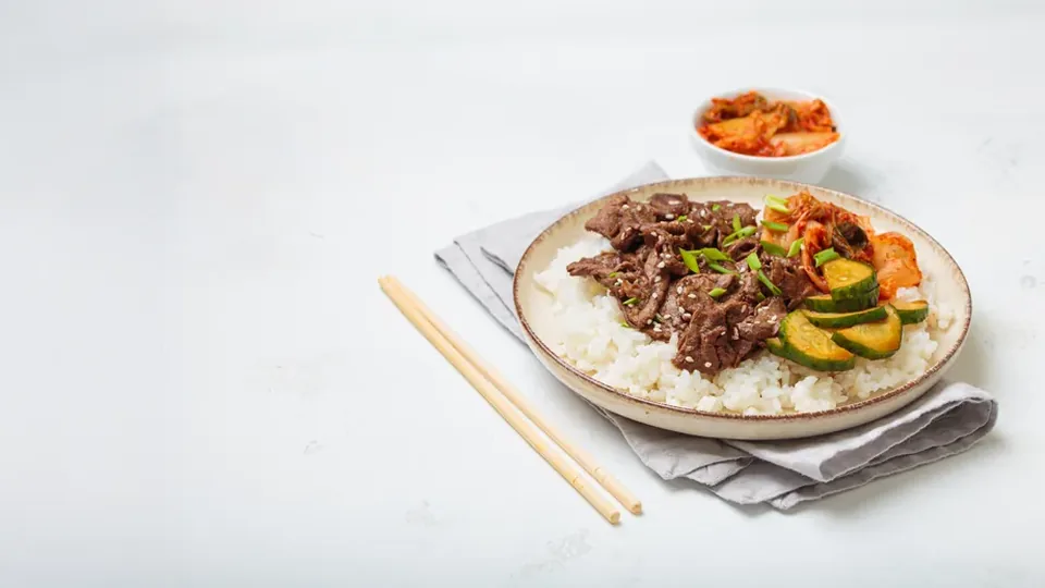 Bulgogi, rice and kimchi. Korean cooking classes commonly teach dishes such as bulgogi, bibimbap, japchae and savoury pancakes.