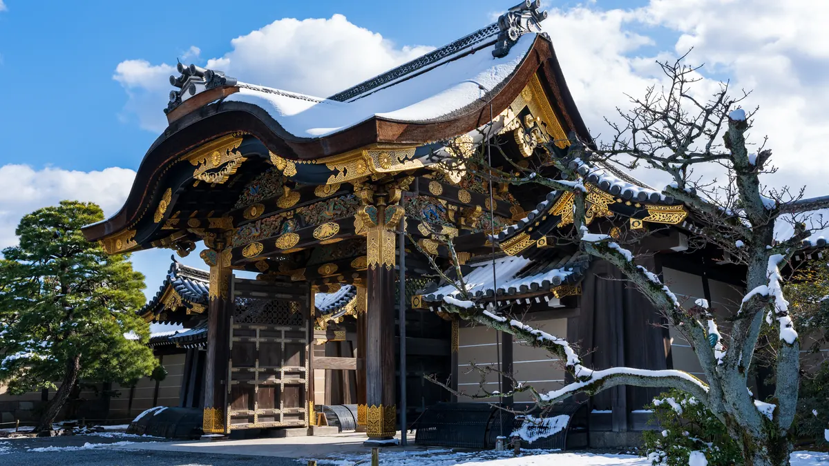 The Karamon gate of Nijo Castle with snow on its roof